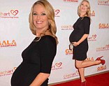 Baby on board: Brooke Anderson showed strong maternity style on Thursday at the CoachArt Gala of Champions in Beverly Hills, California