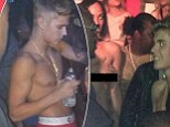 'He touched my a**!': Justin Bieber parties with topless woman at Texas strip club... as he 'shocks' strippers with his raunchy behaviour