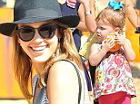 This one's mine! Jessica Alba's daughter Haven finds her perfect mini pumpkin as the family visit Mr Bones