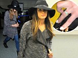 'She talks about Cory all the time': Incognito Lea Michele wears healing crystal necklace and diamond sparkler landing at LAX