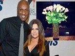 Is love in bloom? Khloe Kardashian posts picture of roses... as speculation mounts she could reconcile with Lamar Odom