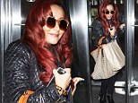 You don't need those to look skinny! Snooki hides behind giant bags as she promotes new season of reality show 