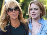 Dina Lohan blames 'stress from paparazzi' for drink driving as she appears in court... but where's Lindsay? 