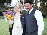 Doting husband: Brandon Blackstock gave new wife Kelly Clarkson his jacket as the sun began to set on their romantic wedding day on Sunday