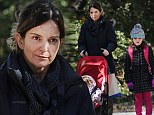 She's just like us! Tina Fey goes make-up free to take her daughters Alice and Penelope and dog for a walk in the park