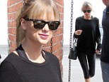 So that's how she gets her amazing body! Taylor Swift shimmies her svelte figure into a Ballet Bodies class