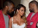 That perked him up! Sleepy Kanye West takes a nap during fiancee Kim Kardashian's birthday bash... but wakes up when he spies her ample cleavage 