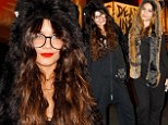 Joining the pack! Vanessa Hudgens has a howling good time with sister Stella in wolf ears and paws at Halloween party