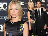 'Big night out!' Kelly Ripa is radiant in a black floral gown as she attends awards bash with husband Mark Consuelos