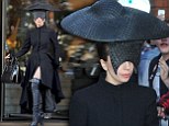 Lady Gaga hides her face in bizarre hat as she wears all black mourning the death of her dog Alice