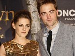 On again, off again: Kristen Stewart and Robert Pattinson in November last year