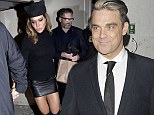 Robbie Williams looks like the cat that's got the cream as his stunning wife Ayda Field wows in sexy feline costume for Halloween
