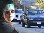 Are they back on again? Kristen Stewart and Robert Pattinson pictured leaving his Beverly Hills home after pair enjoy a four hour rendezvous together