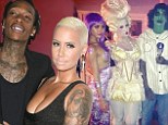 After a week of playing dress-up Amber Rose and Wiz Khalifa ditch the costumes to host The Wiz of TAO Halloween Spectacular in Las Vegas