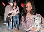 Can we get a doggy bag with that? Three's company for Zoe Saldana and husband Marco Perego as they dine out with her pup 