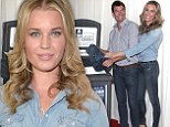 No seven-year itch here! Rebecca Romijn gets flirty with husband Jerry O'Connell at Blue Jeans Go Green party