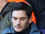 On the sidelines: Hugo Lloris (right) looks on from the stands after Andre Villas-Boas and his staff decided to leave him out of the Tottenham line-up to face Newcastle