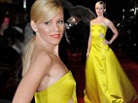 Bring me sunshine: Elizabeth Banks brings some colour to rainy The Hunger Games: Catching Fire premiere in yellow ballgown