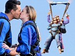 Falling for each other... quite literally! LeAnn Rimes and Eddie Cibrian are REALLY happy to see each other after taking part in charity skydive