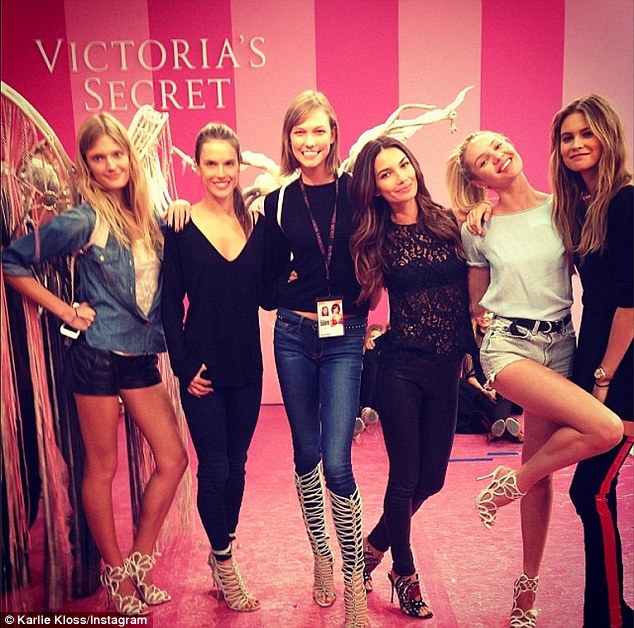 Girl power: Constance Jablonski, Alessandra Ambrosio, Karlie Kloss, Lily Aldridge, Candice Swanepoel and Behati Prinsloo (from left) donned their sexiest heels as they posed pre-hair and make-up with elaborate wings