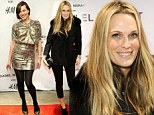 Molly Sims covers up in bulky coat while fellow model Milla Jovovich shows off her slender frame in gold frock at H&M event 