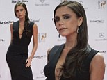 Smoky gets in your eyes: Victoria Beckham goes overboard with the eyeliner as she arrives at Bambi Awards in black maxi