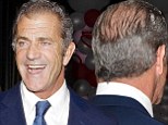 Mel Gibson tries and fails to disguise his large bald patch as he leaves Hollywood event