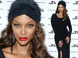 Once a model, always a model! Tyra Banks vamps it up with a black cutaway dress and turban at a New York gala