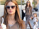 Have a big bite... you deserve it! Alessandra Ambrosio enjoys sweet treat with daughter as she relaxes after Victoria's Secret show