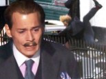 Action man Johnny Depp gets hit by a car (but don't worry, it's just a scene for his new movie)