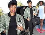 A first class act! Jennifer Hudson is stylishly sleek in black leggings and green jacket as she jets out of Los Angeles