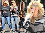Terrific trio: Heidi Klum took her mother Erna and daughter Lou to Starbucks in Santa Monica, California on Thursday