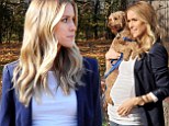 She's starting to show! Kristin Cavallari displays her brand new baby bump as she takes pooch Brando out for a stroll