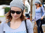 Keeping healthy for two! Olivia Wilde shows off her pregnant form as she finishes a light yoga workout