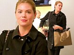Kate Upton hides her famous figure for shopping trip