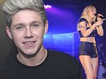 Niall Horan watches his scantily-clad ex Ellie Goulding belt it out during G-A-Y performance