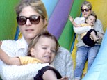 Mommy, are you sure about this? Selma Blair loves the big yellow slide but her cute toddler Arthur looks uncertain