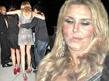 Worse-for-wear Brandi Glanville gets carried out of her 41st birthday party at Fleming's Wine Bar