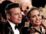 Together at last! Brad Pitt and Angelina Jolie are reunited after months apart as she receives Hollywood humanitarian award 
