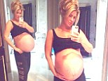 'I'm soooo over being pregnant!' Kim Zolciak displays 48-inch baby bump as she prepares to welcome twins