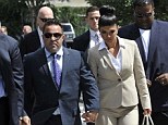 More charges: On Monday Theresa and Joe Giudice were indicted on two more counts of fraud. The pair, seen here facing court in August, have already pled not guilty to 39 charges