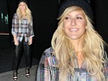 Ellie Goulding dresses down in plaid shirt and leather-effect trousers for Mini Cooper party in central London 