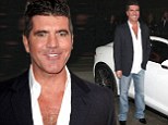 Too much botox Simon? Cowell pulls series of odd facial expressions after arriving at car launch