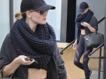Rosie Huntington-Whiteley manages to look gorgeous after an exercise session as she leaves gym in crop top and cut-out leggings