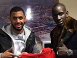 Good friends: Yann M'Vila (left) poses with France team-mate Mamadou Sakho following the Merseyside derby