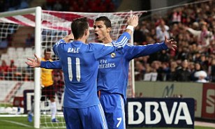 Kings of Spain: Cristiano Ronaldo and Gareth Bale celebrate after Real Madrid score their first