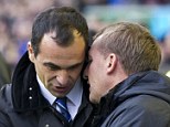 Old friends: Roberto Martinez welcomes Brendan Rodgers to Goodison Park
