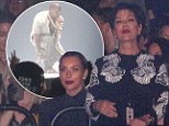 She can't keep up! Kim Kardashian, left, appeared reserved, as her mother Kris Jenner, right, danced the night away as the two watched Kanye West's performance at Madison Square Garden in New York City on Saturday