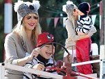 A bear-y nice day at the farm! Real Housewives of Beverly Hills star Brandi Glanville spends day playing with son Jake while wearing a koala hat 