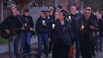 Candlelight vigil march held to honor George Moscone, Harvey Milk